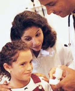 young girl talking to doctor